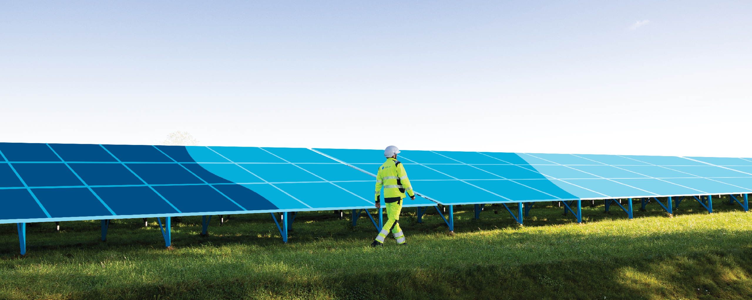 Man walking next to a solar panel